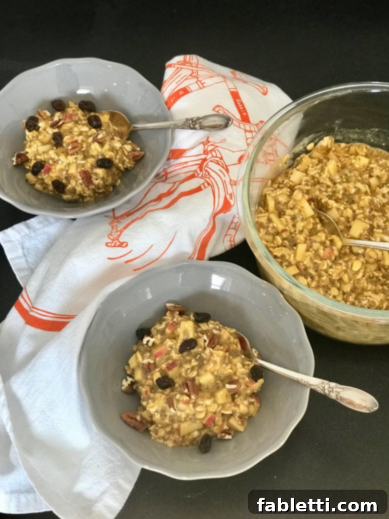 Pumpkin Overnight Oats topped with nuts and dried fruit, ready for a burst of flavor and added nutrition.