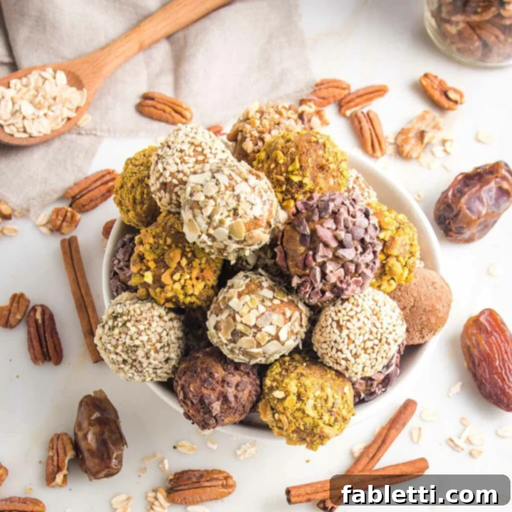 Pumpkin Spice Truffles 12 A charming bowl overflowing with pumpkin balls, each individually rolled in crushed nuts or seeds. Surrounding the bowl are artfully strewn cinnamon sticks, fresh dates, whole pecans, and rolled oats, creating an inviting autumn display.