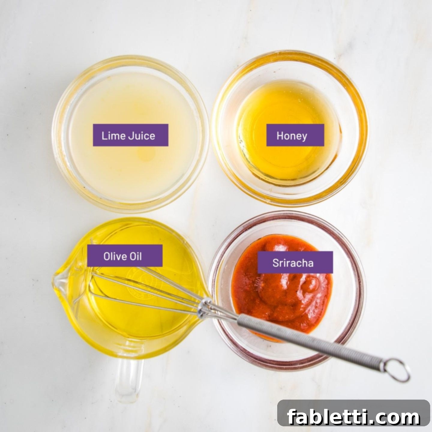 Honey Sriracha Glazed Crispy Roasted Brussels Sprouts 7 A display of small glass bowls, each neatly labeled, containing the key ingredients for the sauce: fresh lime juice, golden honey, rich olive oil, and vibrant red sriracha, ready to be combined.