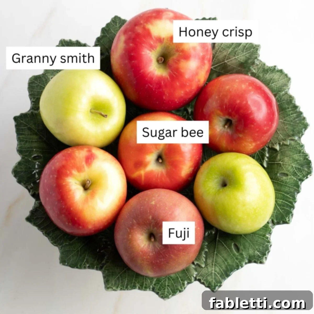 Selection of fresh apples, ideal for making applesauce.