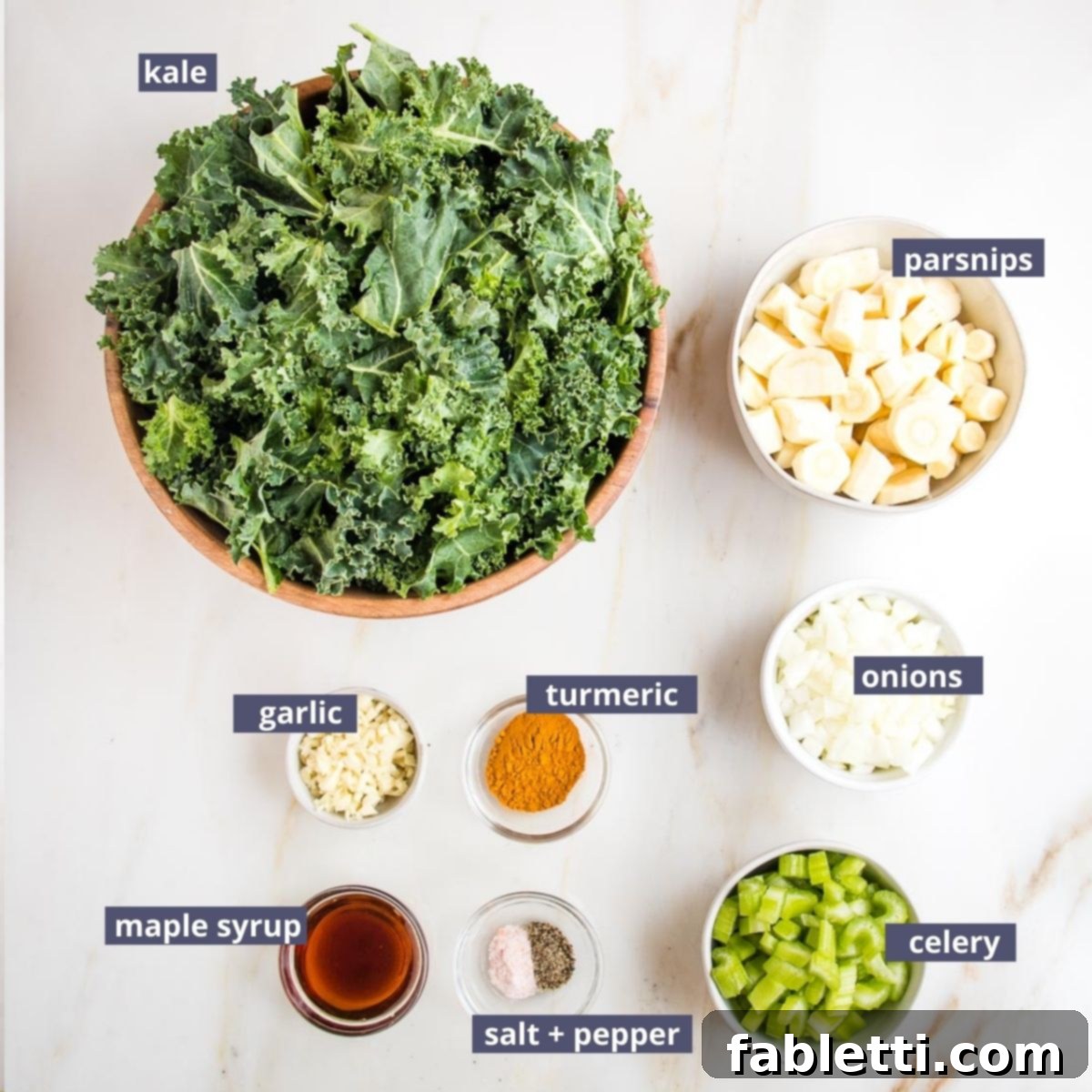 Nourishing Parsnip and Kale Soup 7 Assorted chopped vegetables ready for soup preparation, including onion, celery, and garlic.