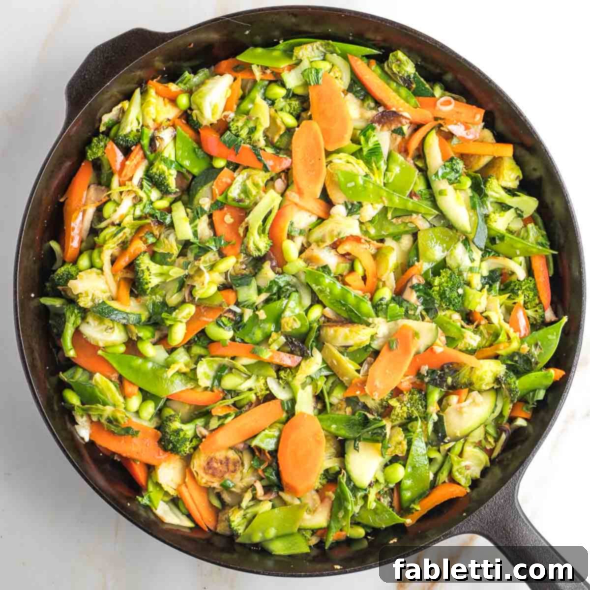 Quick and Flavorful Teriyaki Vegetable Stir-Fry 13 Stir-frying garlic, ginger, and scallions with vegetables.