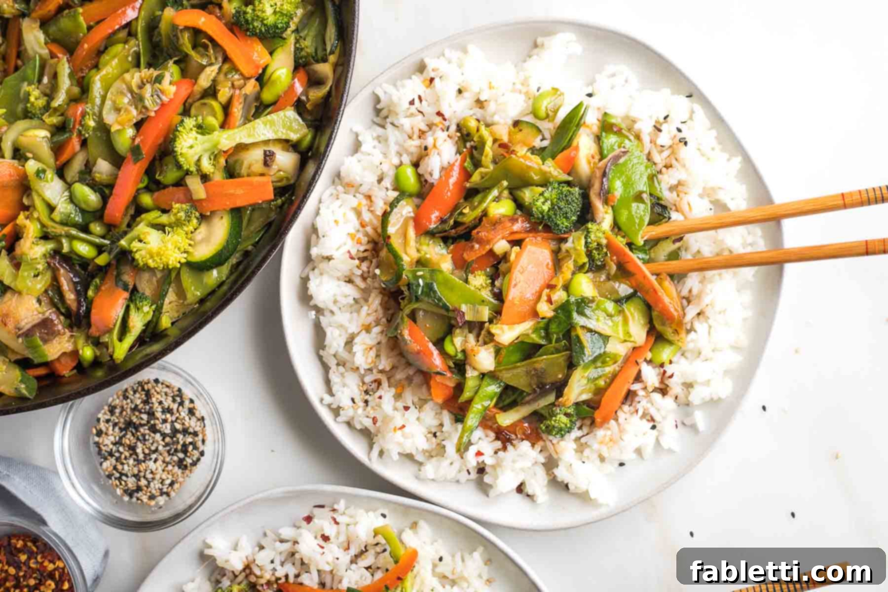 Quick and Flavorful Teriyaki Vegetable Stir-Fry 17 Pan of stir fry veggies, plus a plate of rice topped with the teriyaki vegetables.