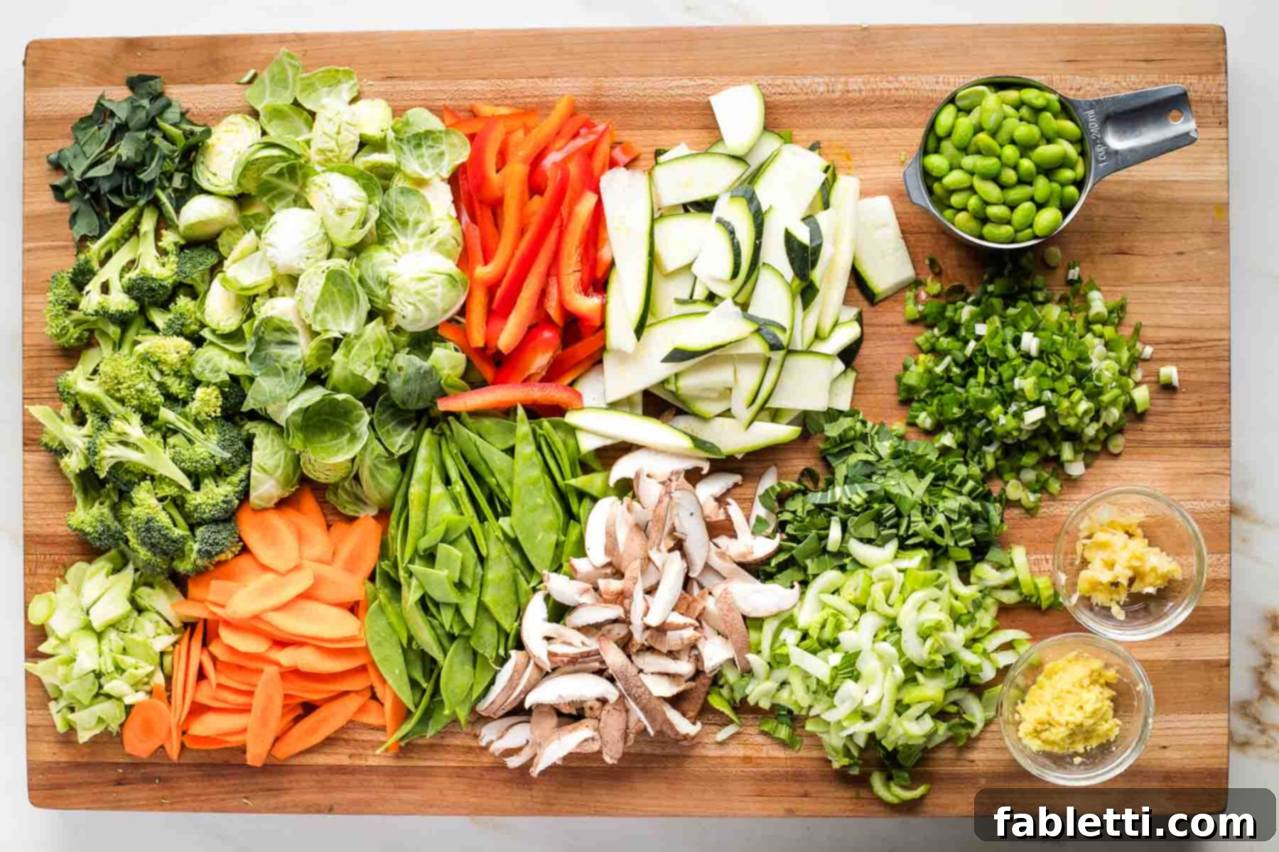 Quick and Flavorful Teriyaki Vegetable Stir-Fry 8 Colorful chopped veggies on a cutting board.