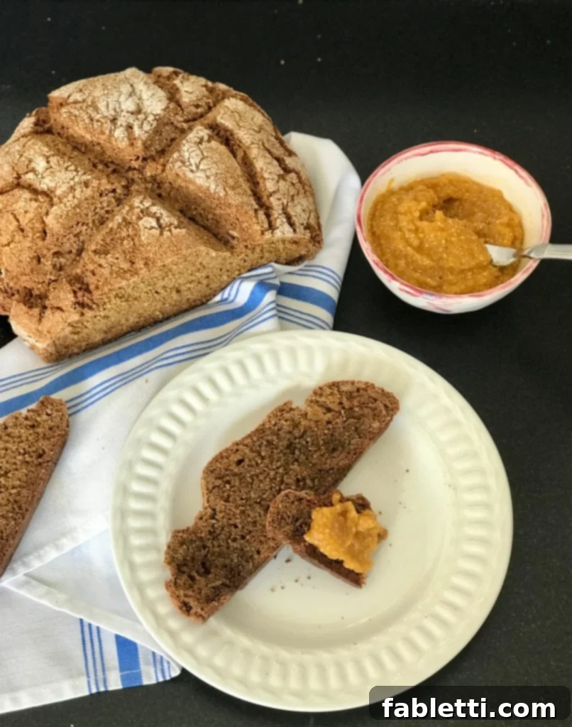 Wholesome Irish Brown Bread 8 A slice of toasted Irish soda bread generously spread with a bright orange chia marmalade.