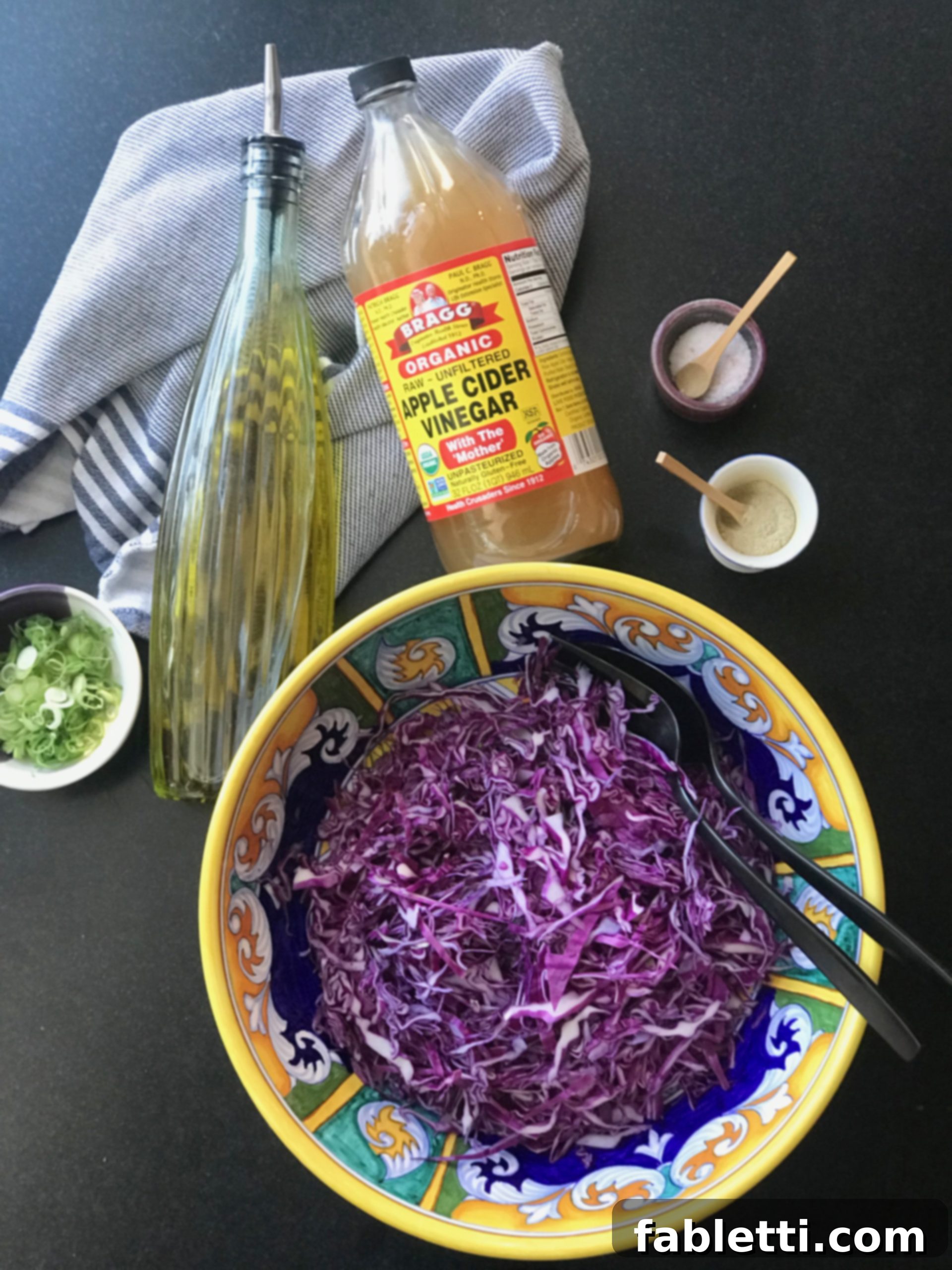 Easy Cabbage Crunch 2 Bowl of thinly sliced cabbage plus olive oil, scallions and apple cider vinegar.