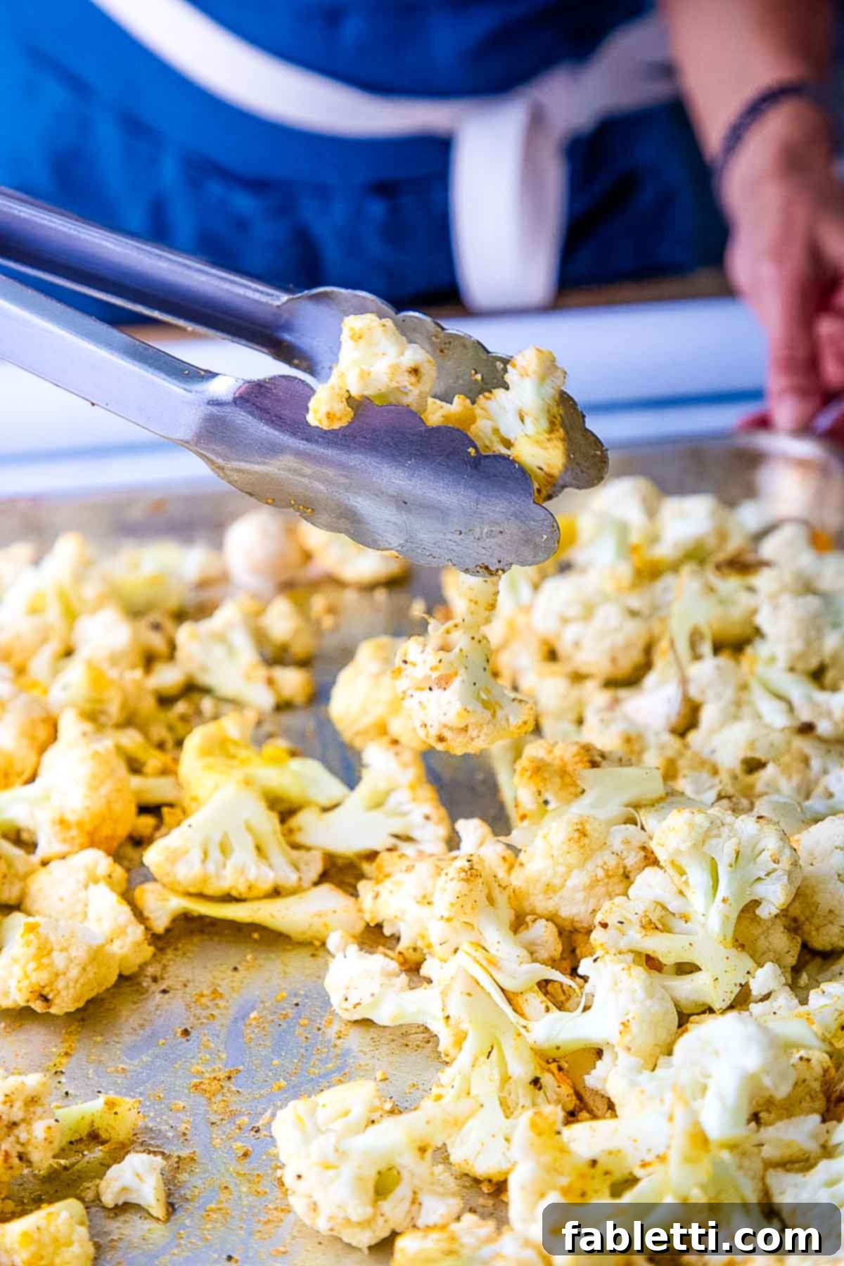 Smoky Roasted Cauliflower Hummus 6 Roasting cauliflower florets and garlic, tossing with tongs.
