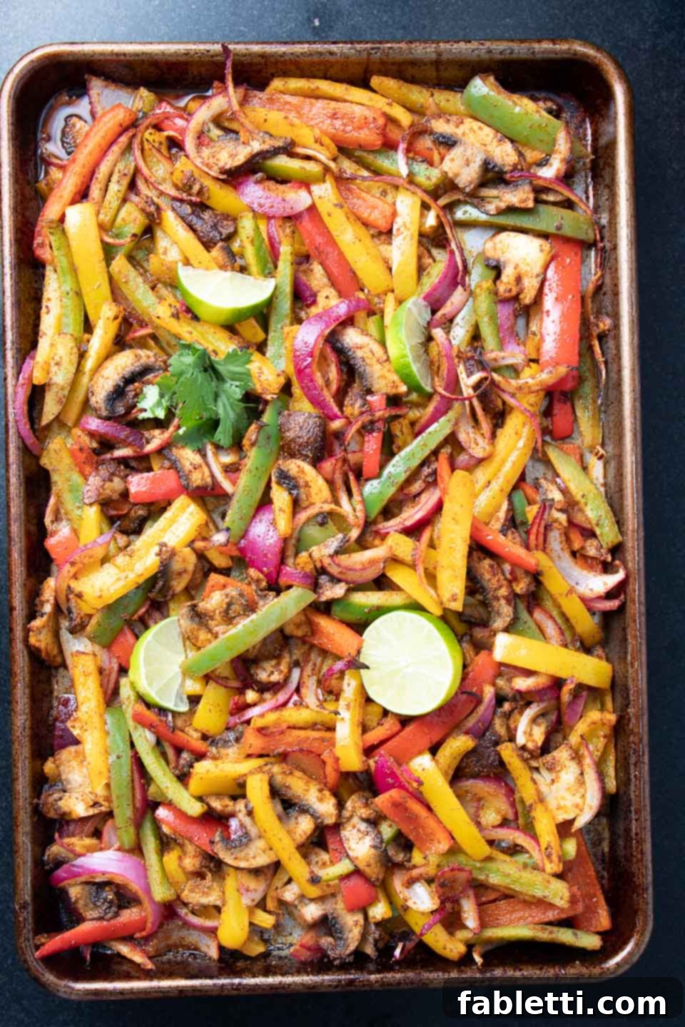 Sheet Pan Veggie Fajitas with lime.