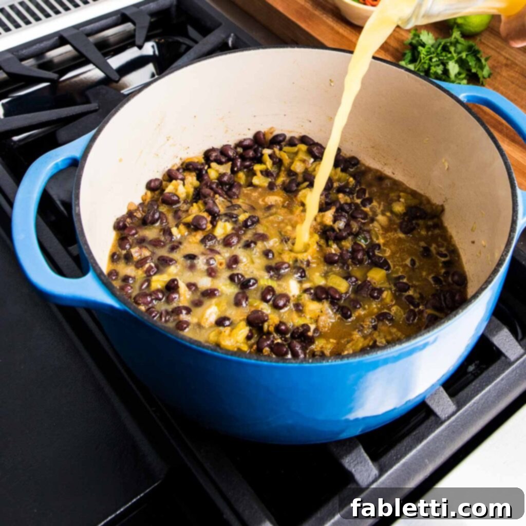 No-Fuss Black Bean Soup 8 Sautéed onions, celery, and jalapeno softening in a pot, forming the aromatic base for the black bean soup.