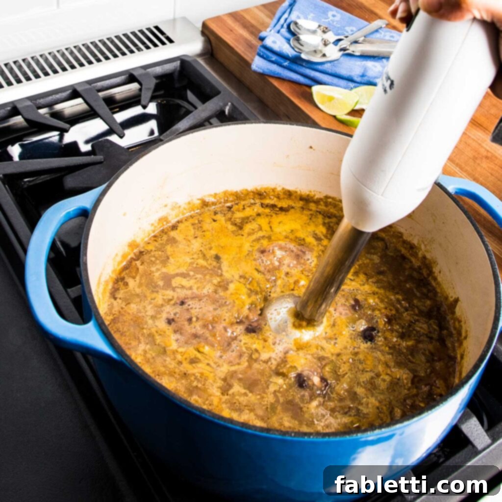 No-Fuss Black Bean Soup 9 Fragrant minced garlic and a blend of spices are added to the sautéed vegetables in the pot, ready to infuse the soup with deep flavor.