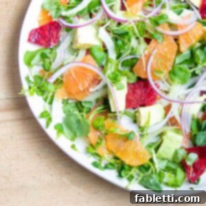 Radiant Orange Fennel 11 Slices of oranges, avocados, onion and watercress, artfully arranged.