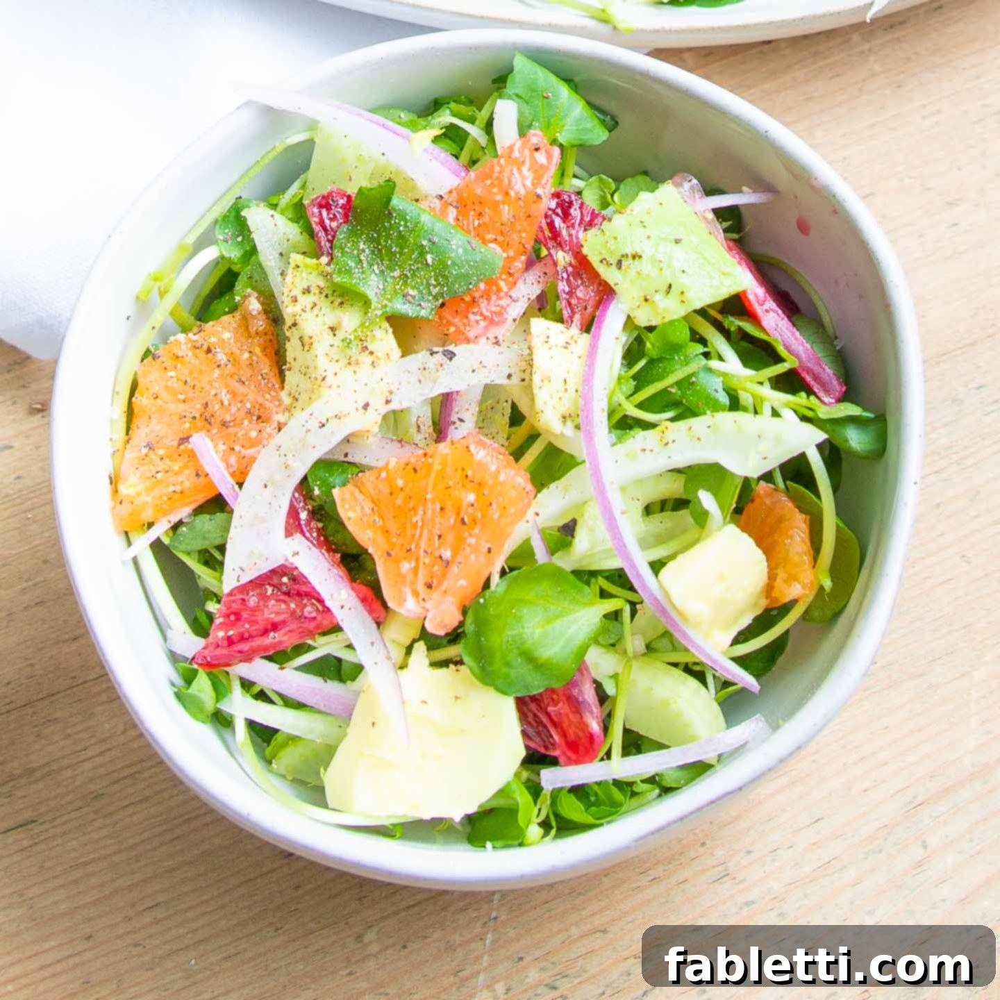 Radiant Orange Fennel 10 Small bowl of orange and fennel salad.