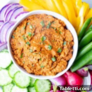 Vibrant Oil-Free Romesco 8 Bright Vegetables surrounding a rich red dip