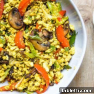 Golden Tofu Scramble 11 Scrambled tofu with mushrooms, red peppers and scallions