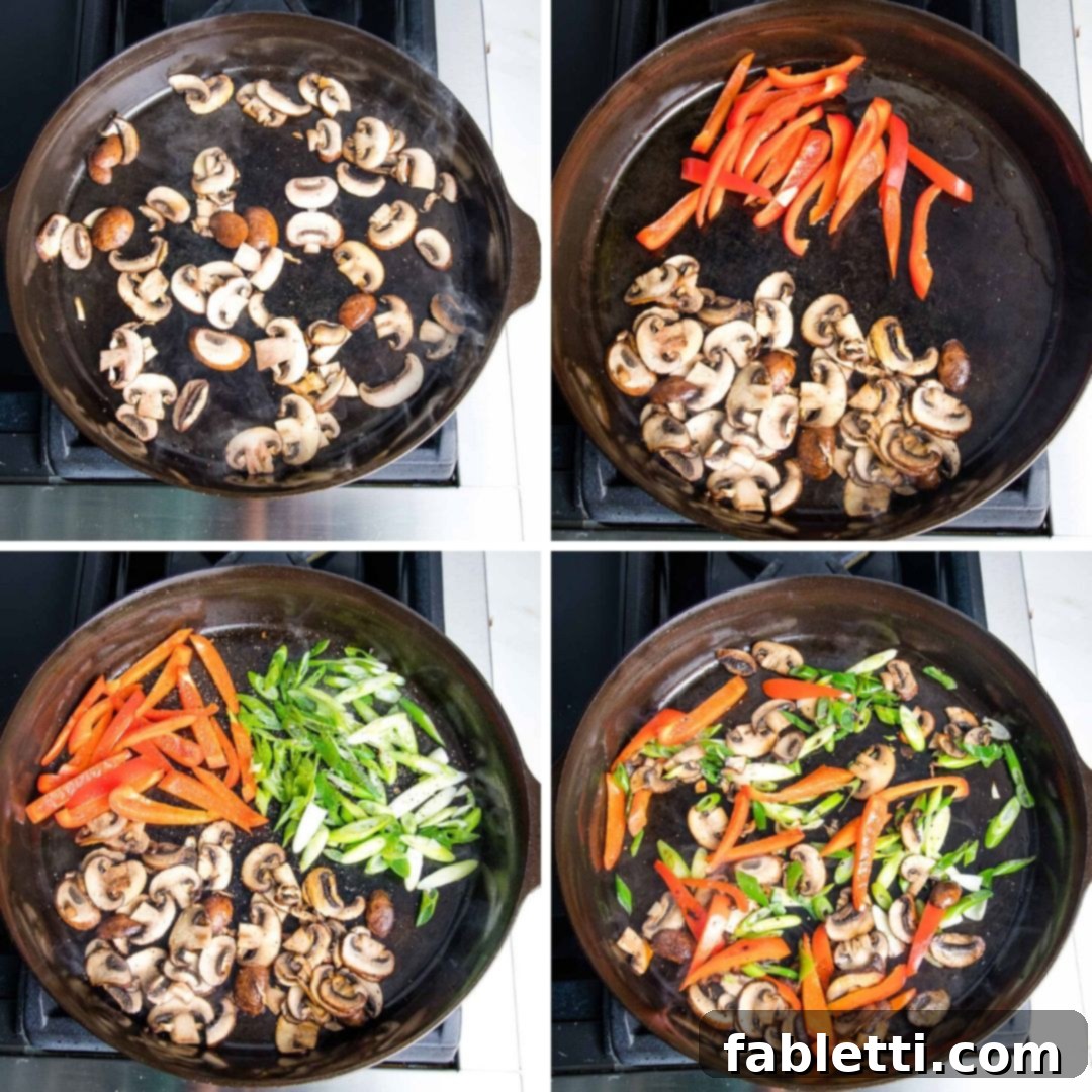 Golden Tofu Scramble 5 Cast Iron skillet with sauteed mushrooms, red peppers and scallions.