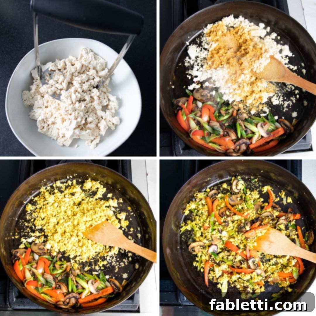 Golden Tofu Scramble 6 Breaking up tofu with a potato masher and then adding it along with spices to cooked veggies in a heavy skillet.