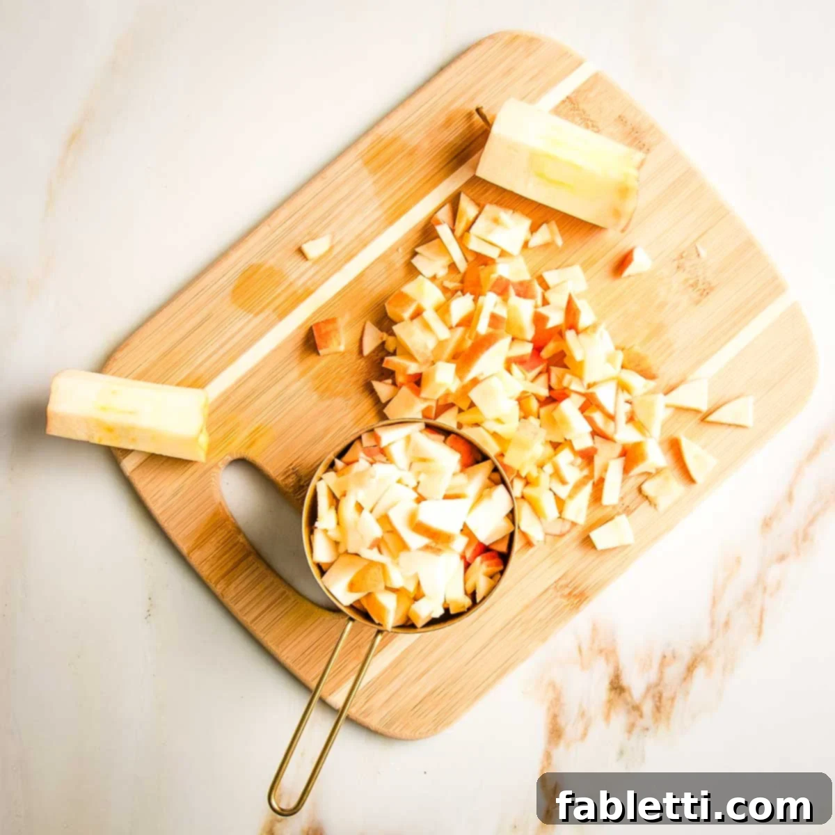 Washed and diced apples ready to be added to the muffin batter.