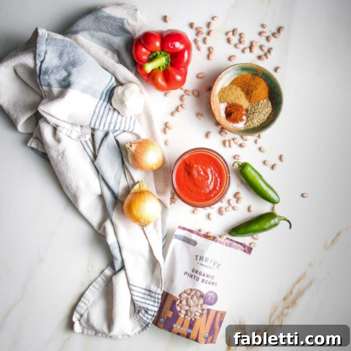 Easy Instant Pot Mexican Pinto Beans 3 Bell pepper, onions, jalapeno, tomato sauce, spices, dried pinto beans.