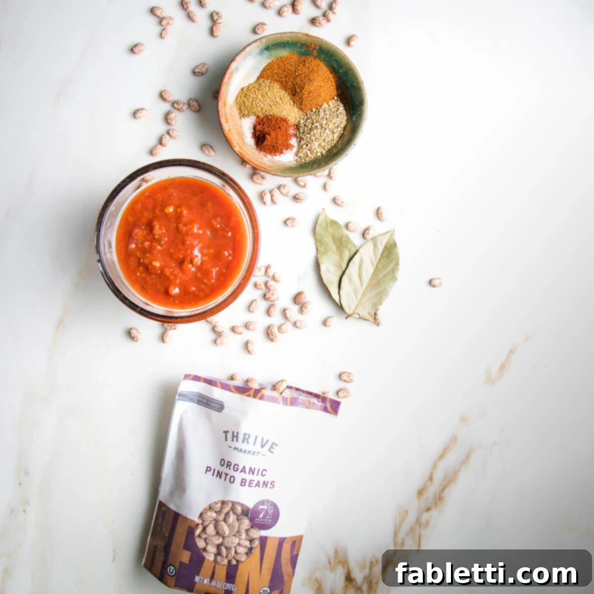 Easy Instant Pot Mexican Pinto Beans 4 Salsa, spices, bay leaves, dried pinto beans.