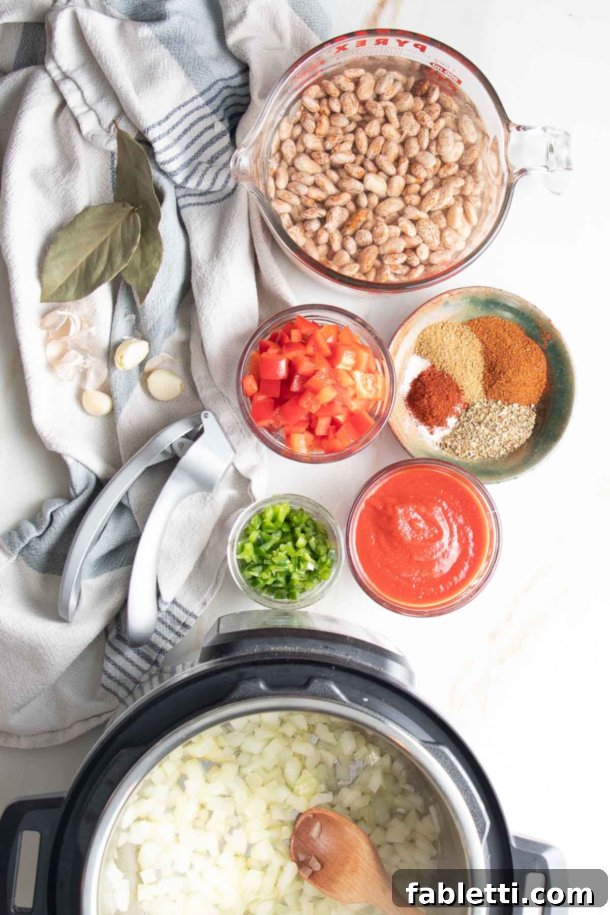 Easy Instant Pot Mexican Pinto Beans 5 Dried, soaked pinto beans, chopped veggies, tomato sauce and spices plus instant pot sauteeing onions.