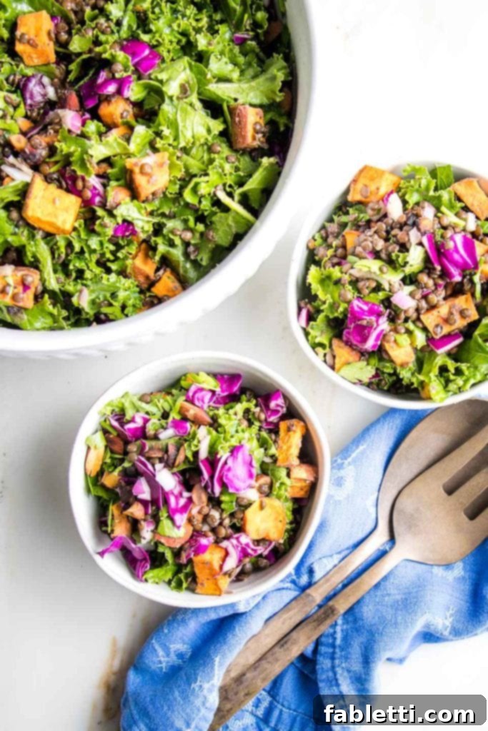 Vibrant Vegan Lentil Medley 14 A large bowl of colorful lentil salad, accompanied by two smaller bowls loaded with purple cabbage, orange sweet potatoes, black lentils, almonds, and onions.
