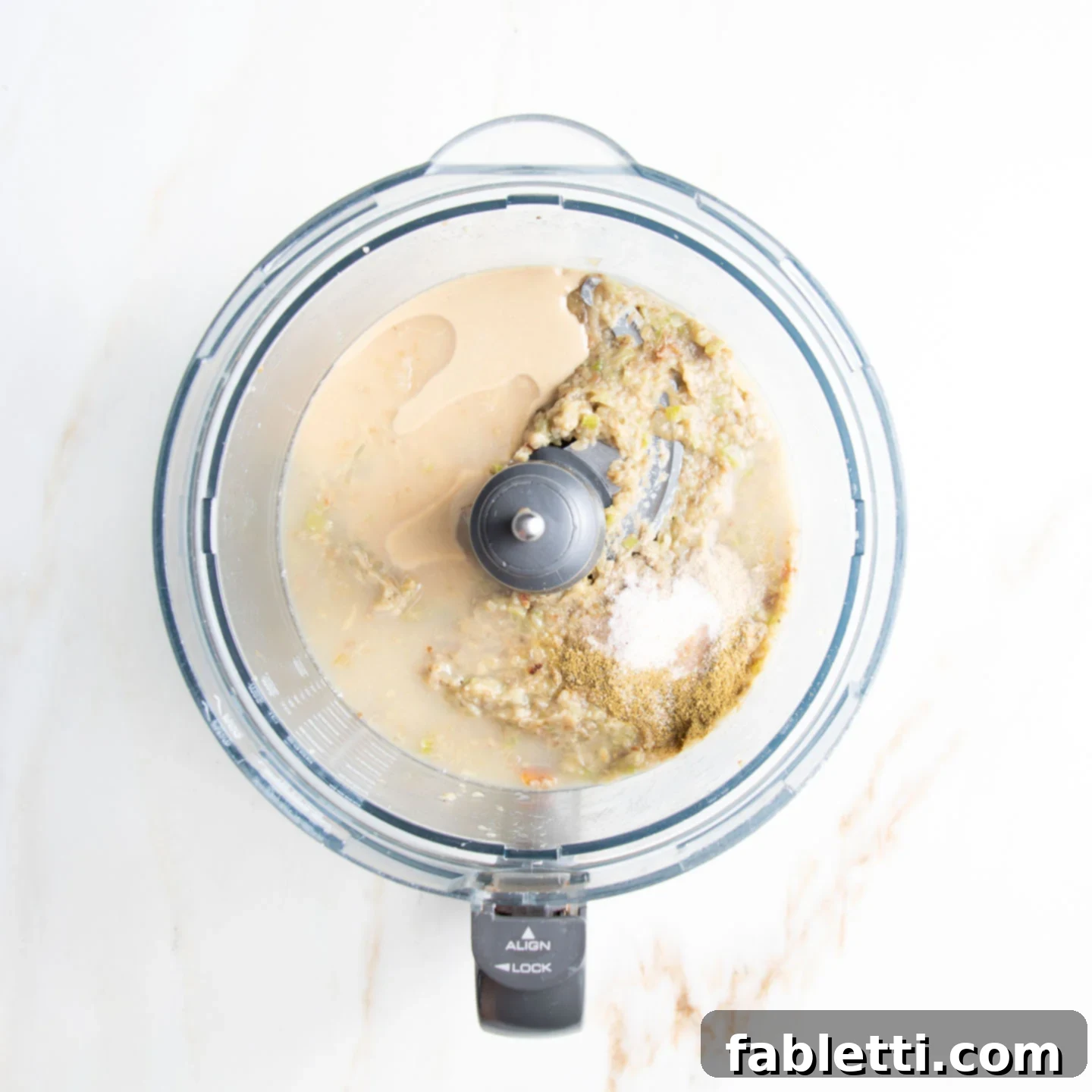 Velvety Roasted Garlic and Tahini Baba Ganoush 10 Tahini, lemon juice and spices added to some eggplant dip in a food processor.