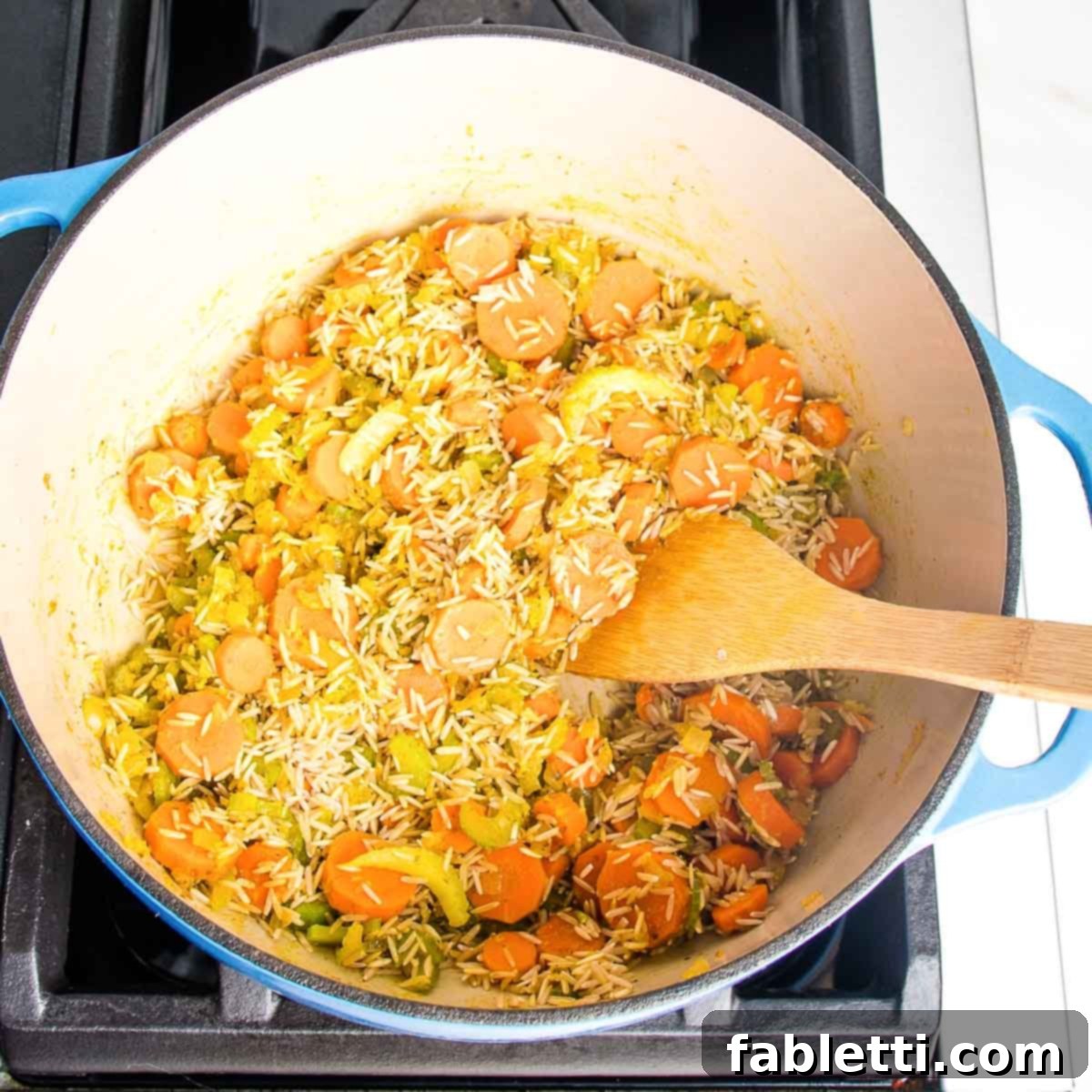 Zesty Vegan Lemon Chickpea Rice Soup 8 Sauteed veggies and spices plus rice, ready for broth.