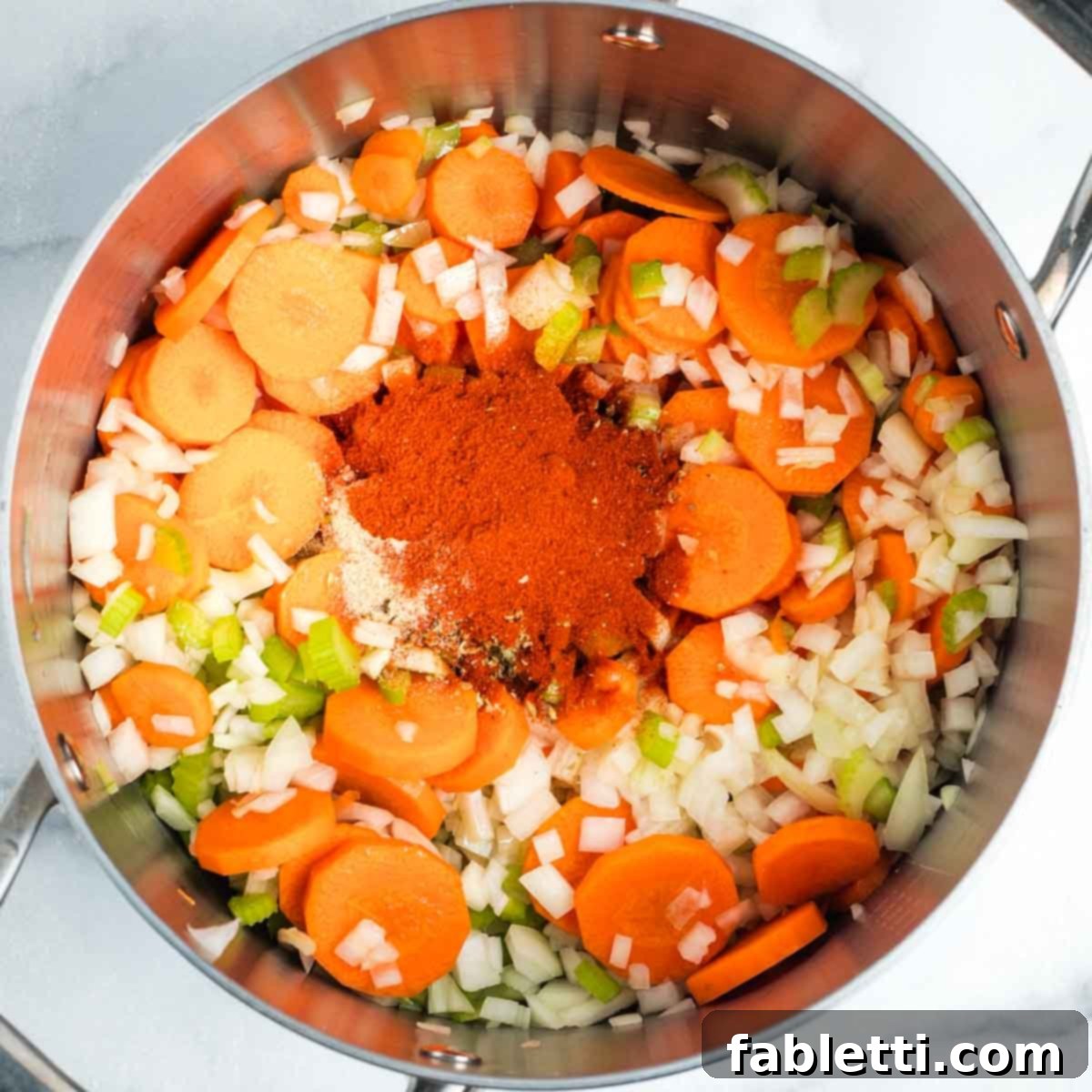 Tangy Vegan Cabbage Soup 5 Adding sweet paprika to the sautéed vegetables.