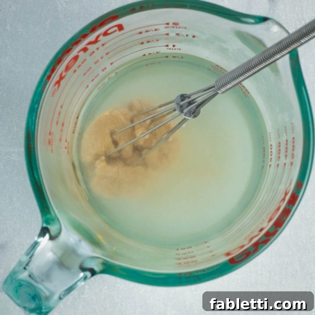 Tangy Vegan Cabbage Soup 10 Preparing the miso slurry.