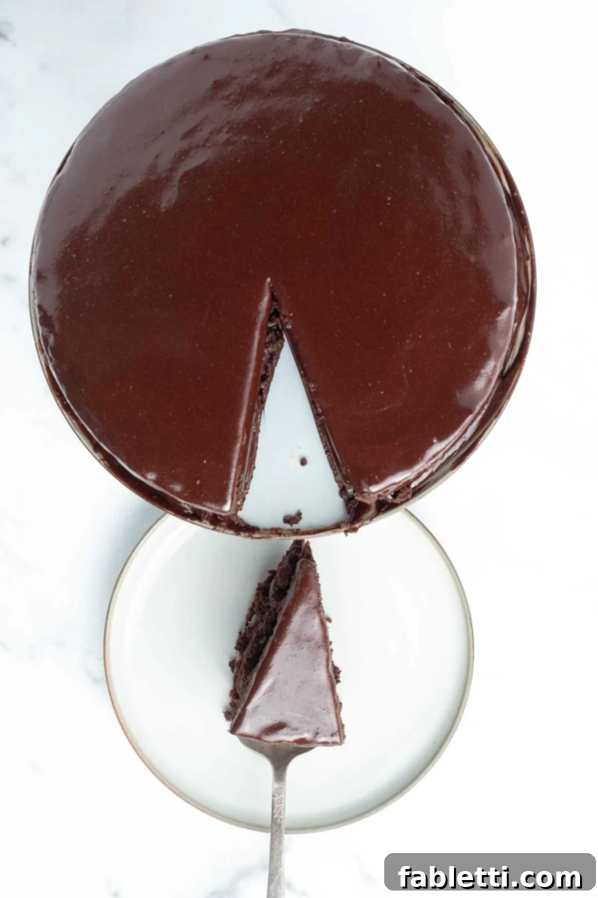 Vegan Flourless Chocolate Cake Delight 2 Slice of flourless vegan chocolate cake on a plate