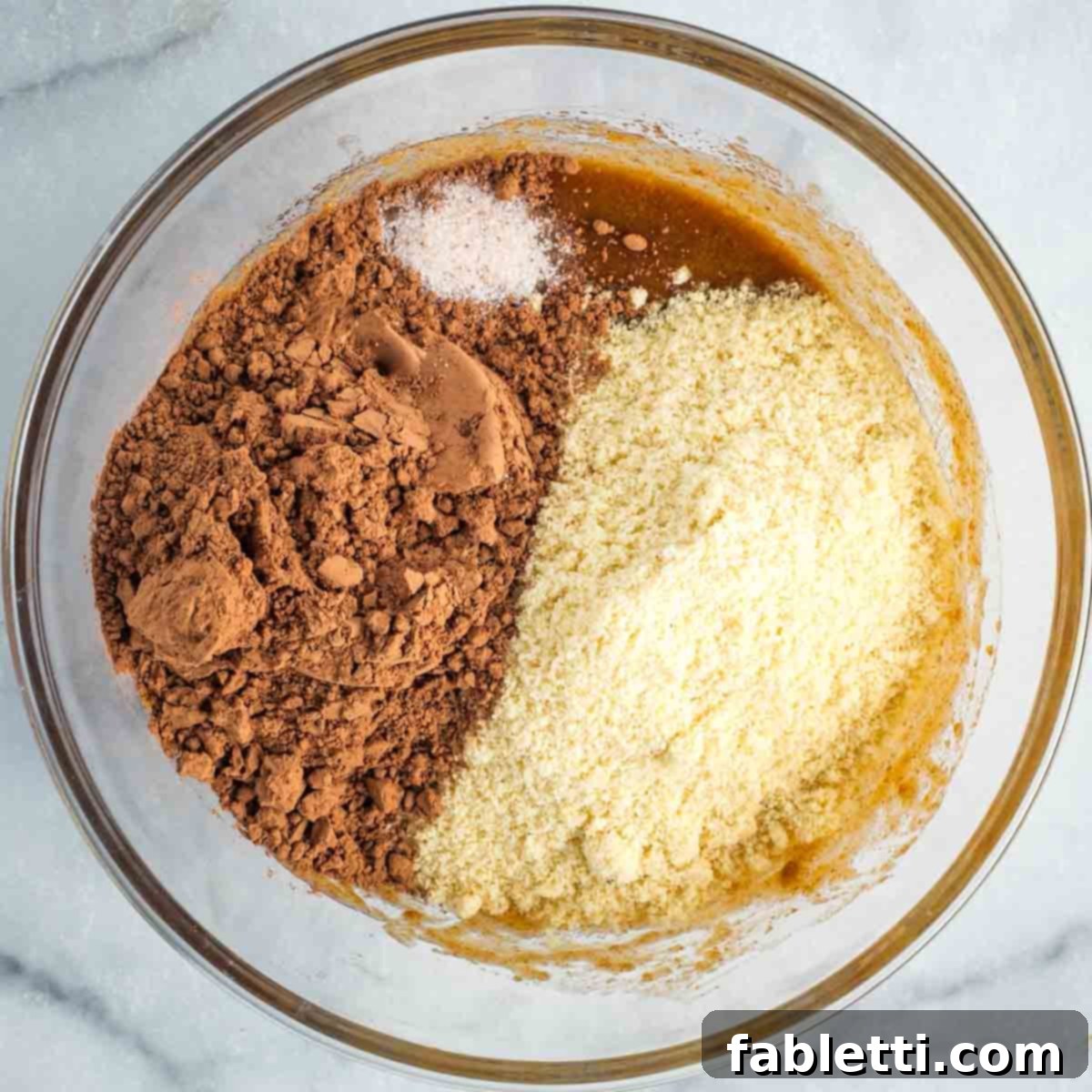 Vegan Flourless Chocolate Cake Delight 5 Adding dry ingredients to the wet mixture