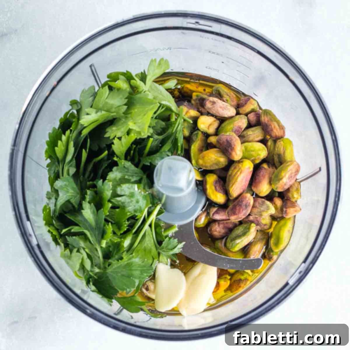 Roasted Radishes with Pistachio-Parsley Drizzle 9 Small food processor bowl with parsley, garlic, pistachios, oil and honey.